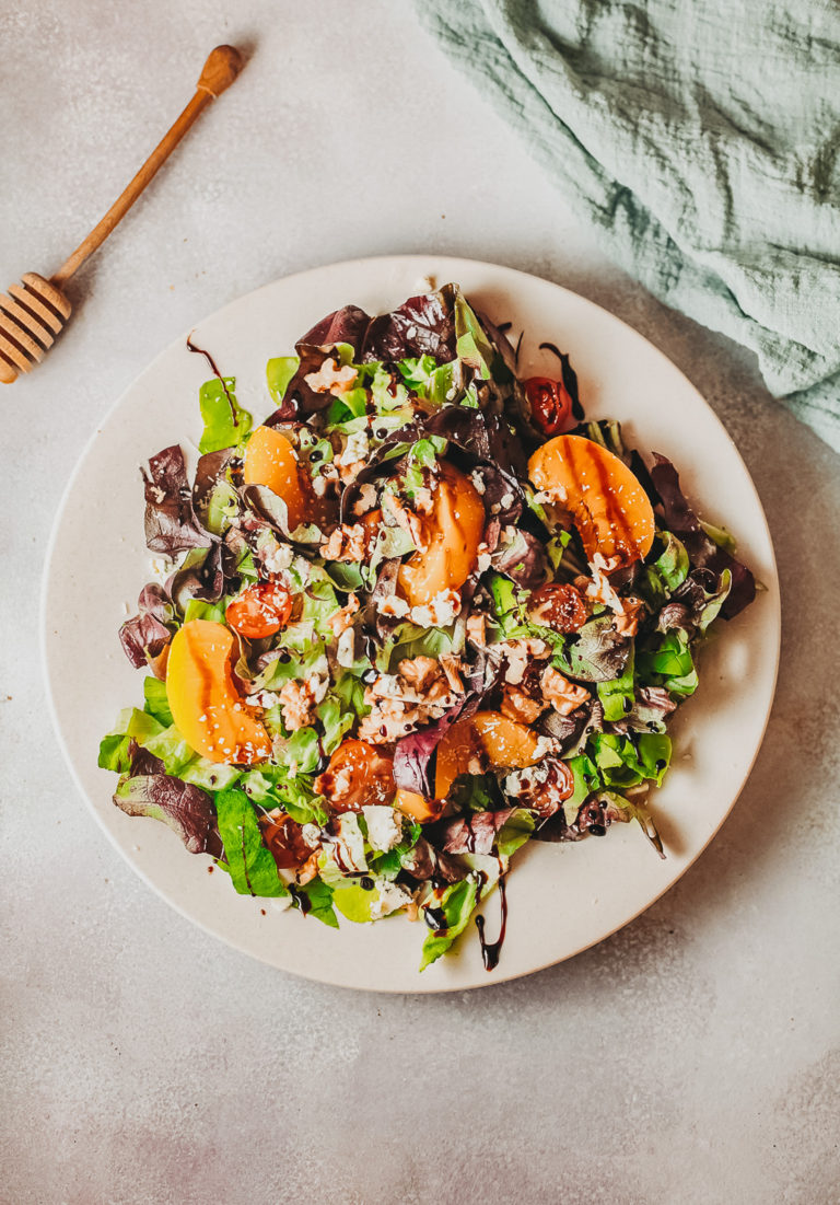 Summer stone fruit salad with peaches, lettuce, and balsamic honey dressing